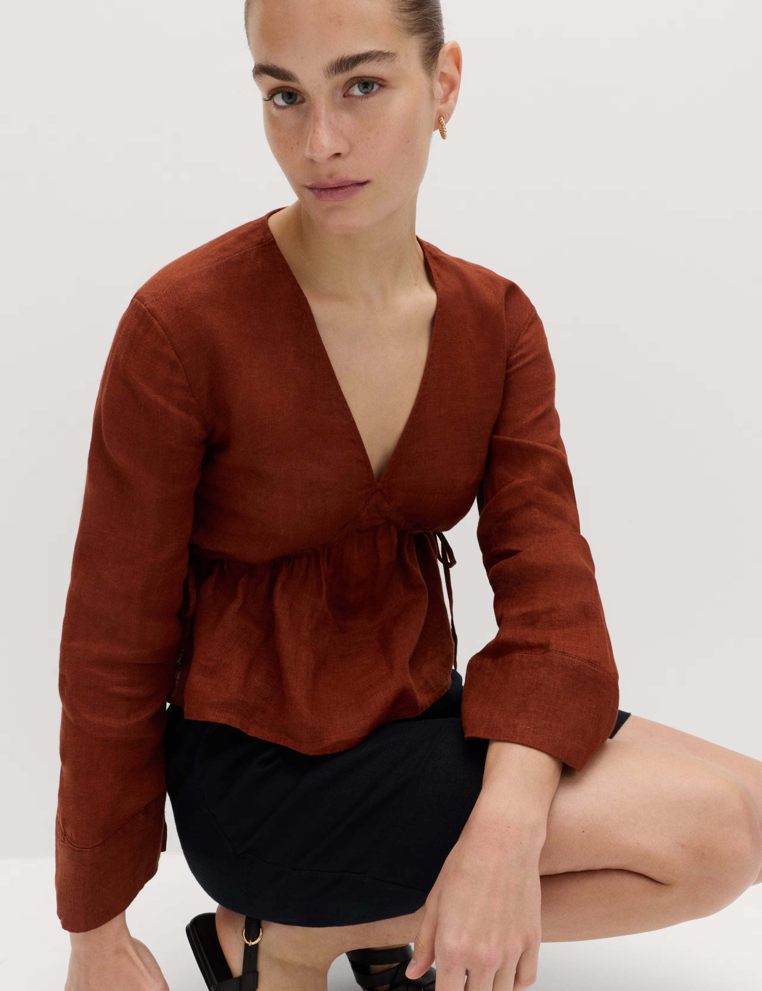 Linen Rust V-Neck Peplum Top